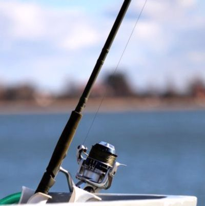 Experienced angler in waterproof boots