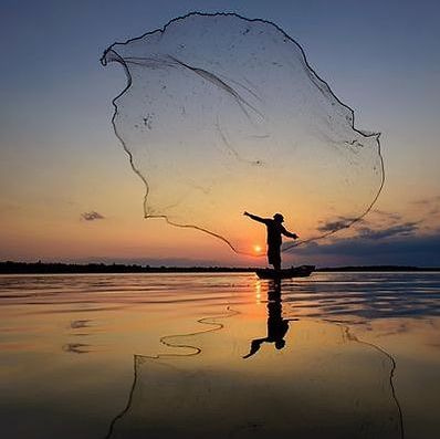 Experienced angler in waterproof boots